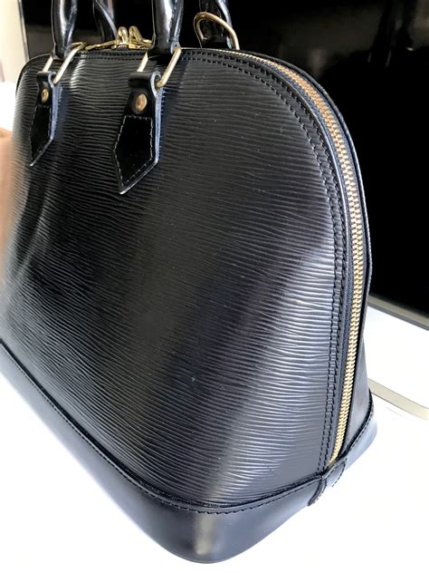 louis vuitton black alma bag